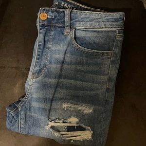 Brand new American Eagle distressed skinny jeans. Size 10.